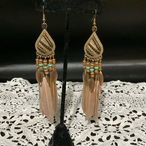 Beautiful feathered Bohemian style woman’s earrings